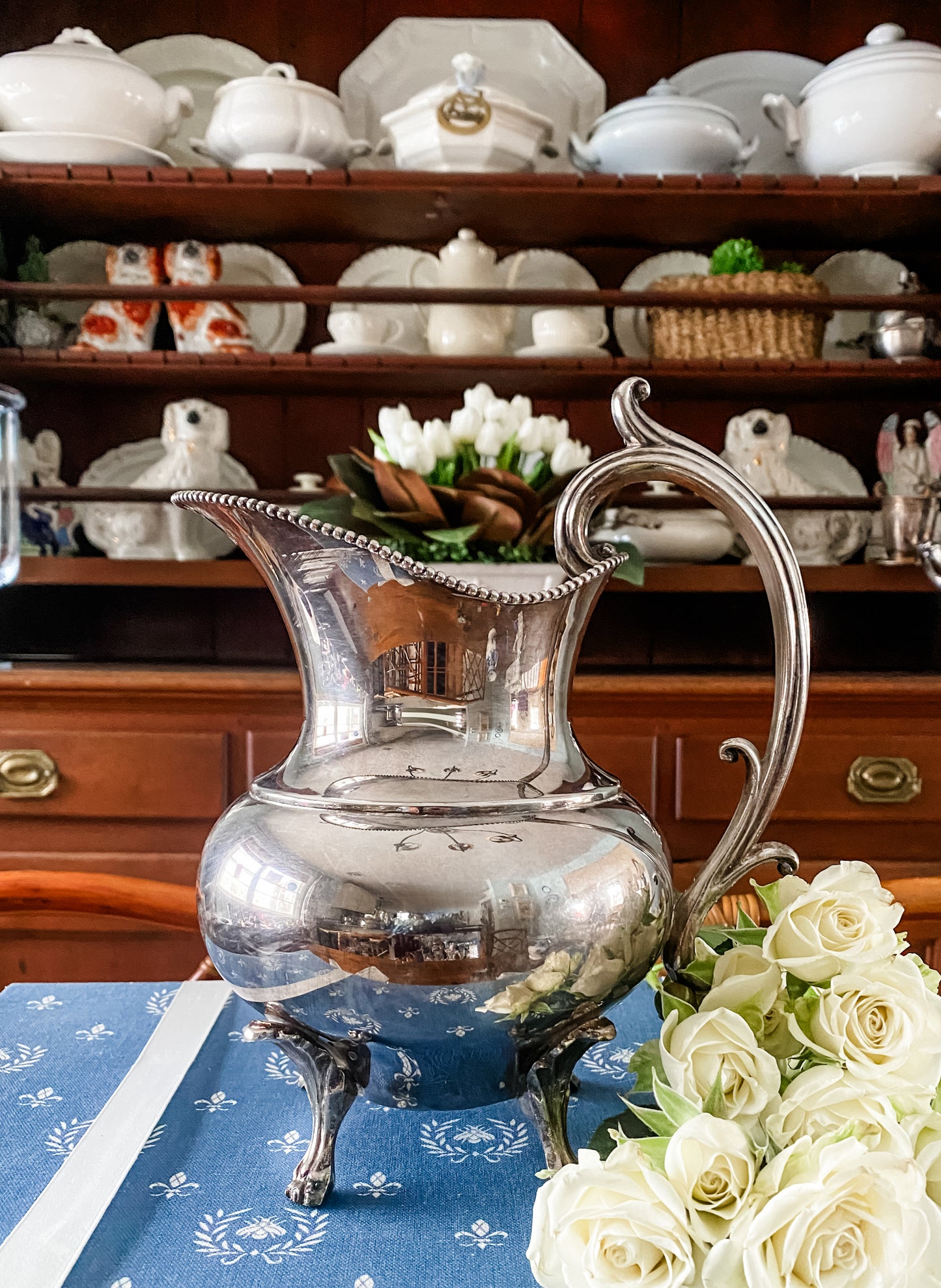 Early 1900s Silver-Plated Pitcher with Regal Lion’s Claw Feet & Ornate Handle
