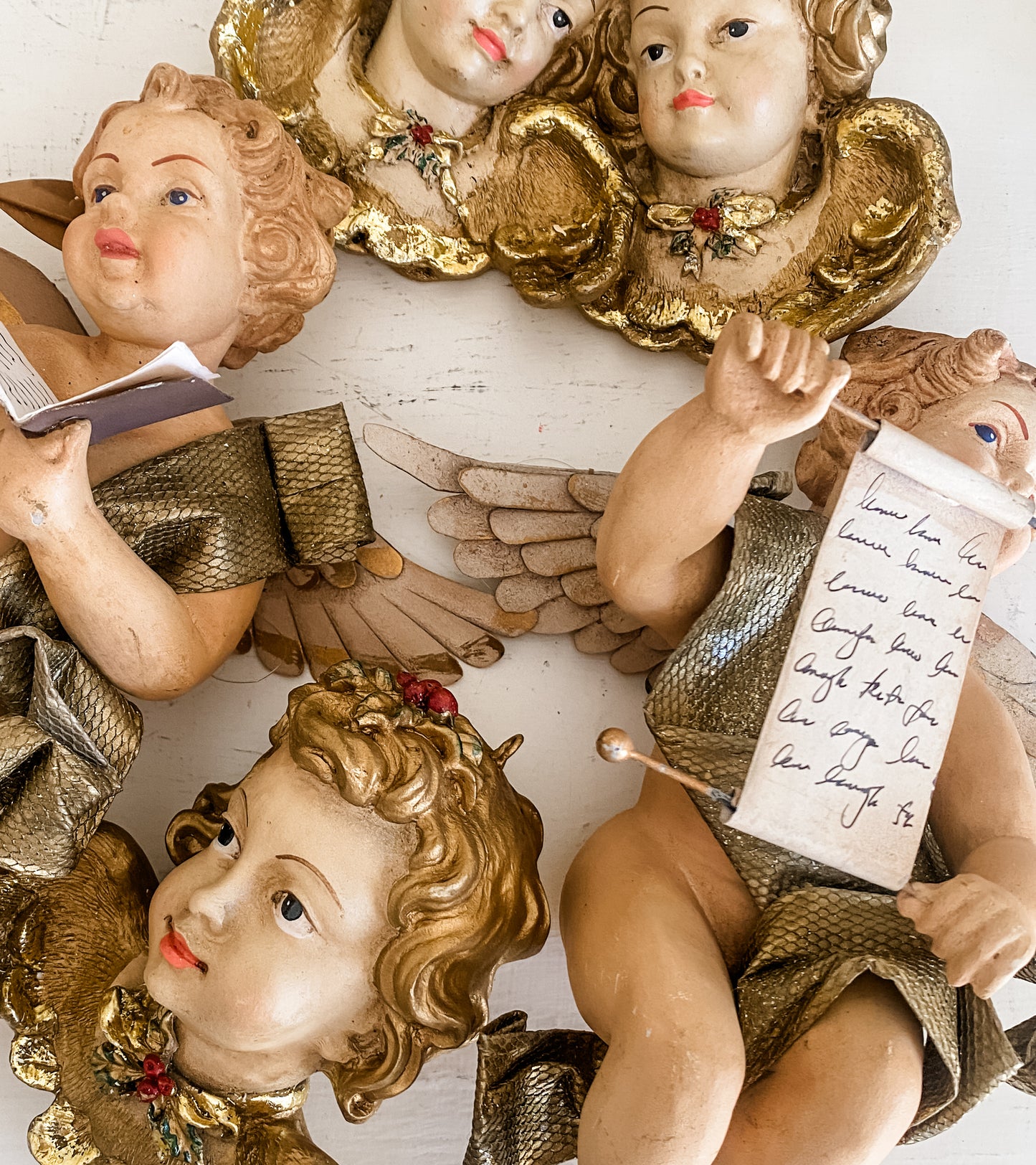 Hand-Painted Putto with Scroll and Metal Wings