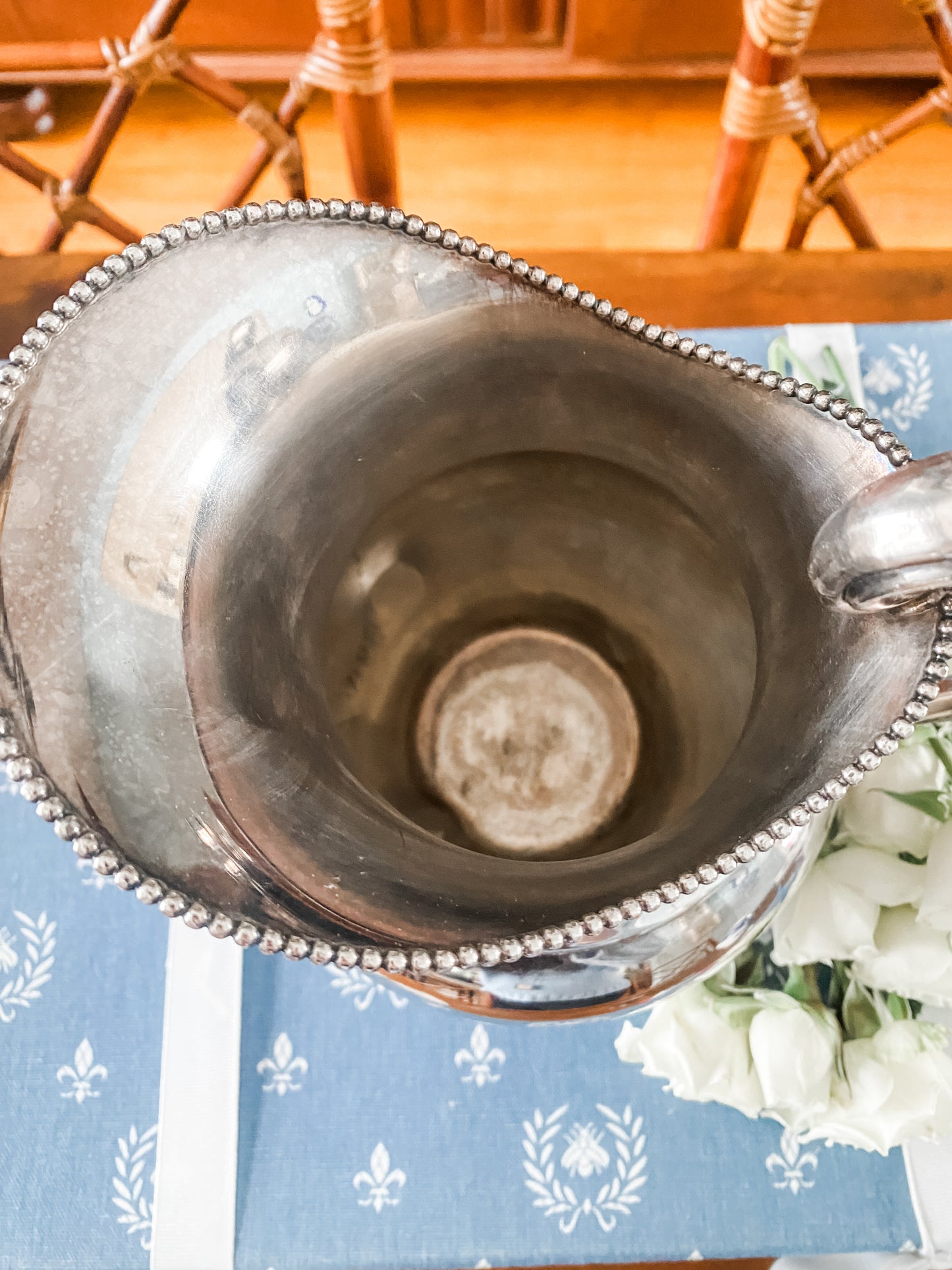 Early 1900s Silver-Plated Pitcher with Regal Lion’s Claw Feet & Ornate Handle