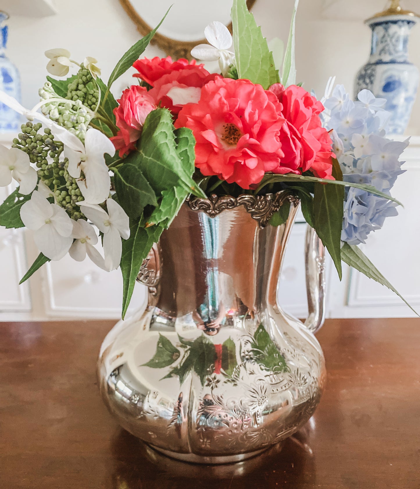Ornate Antique Pitcher by Pool