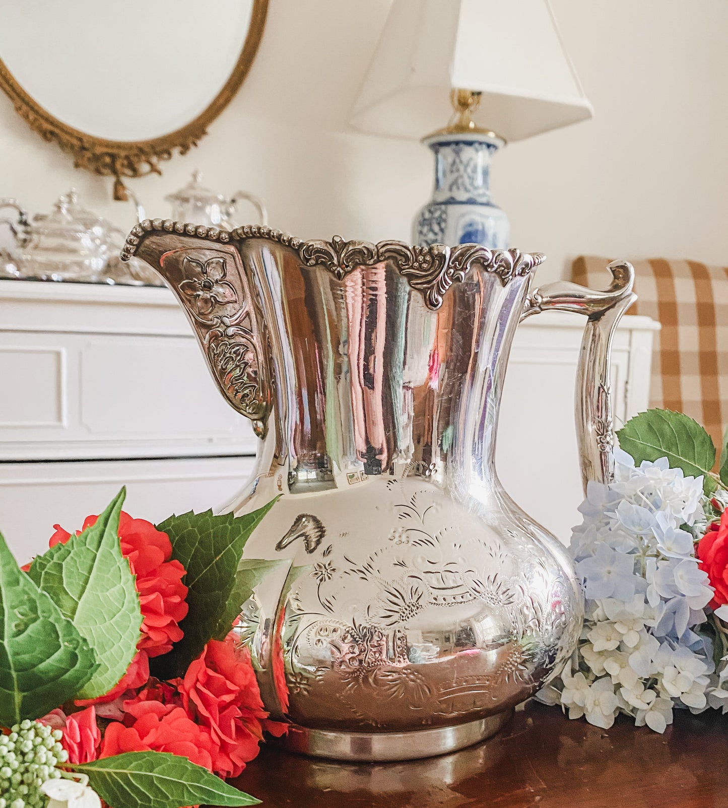 Ornate Antique Pitcher by Pool