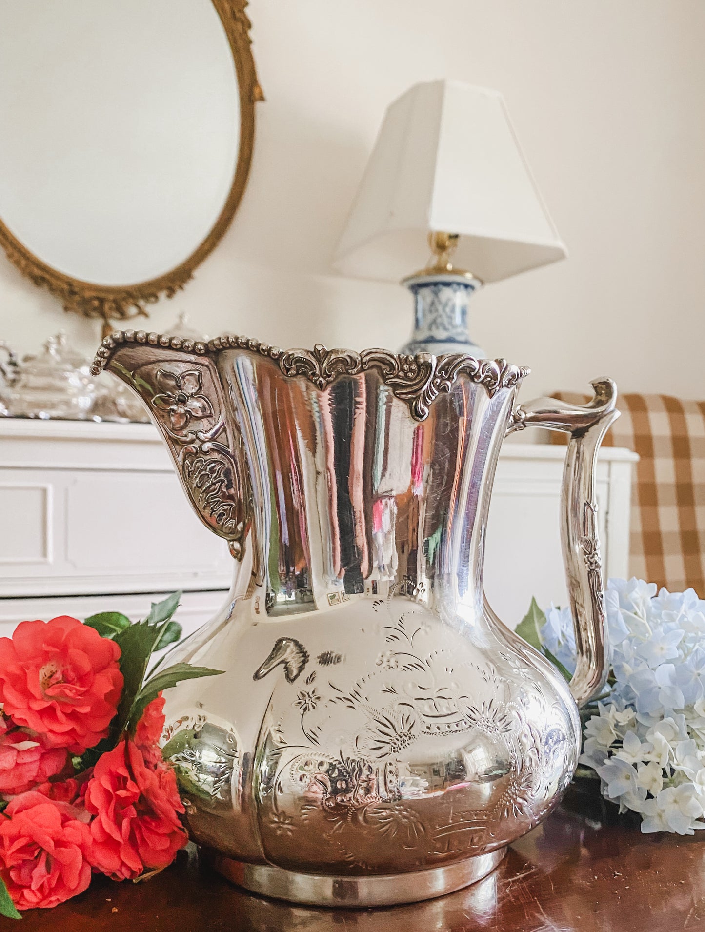 Ornate Antique Pitcher by Pool