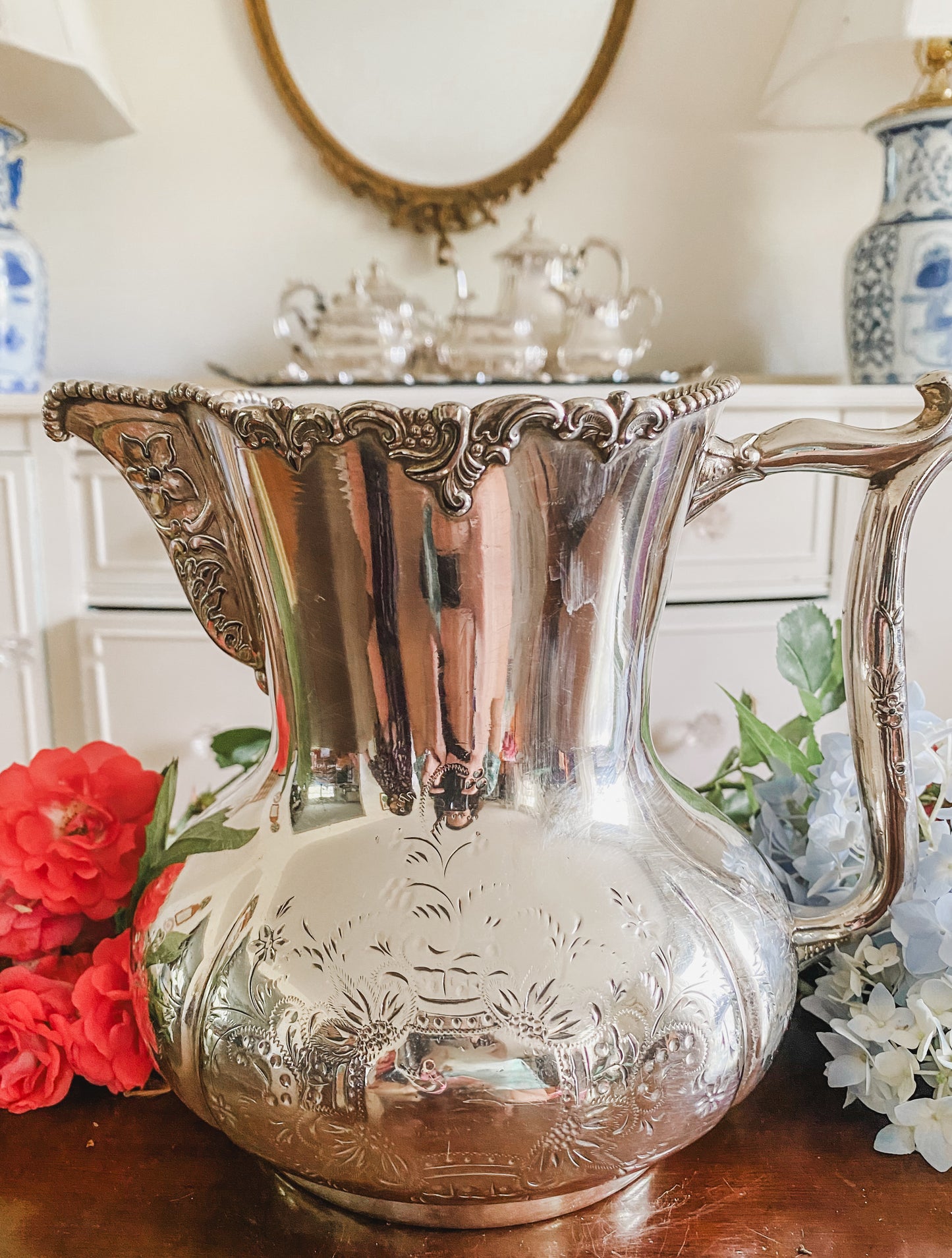 Ornate Antique Pitcher by Pool