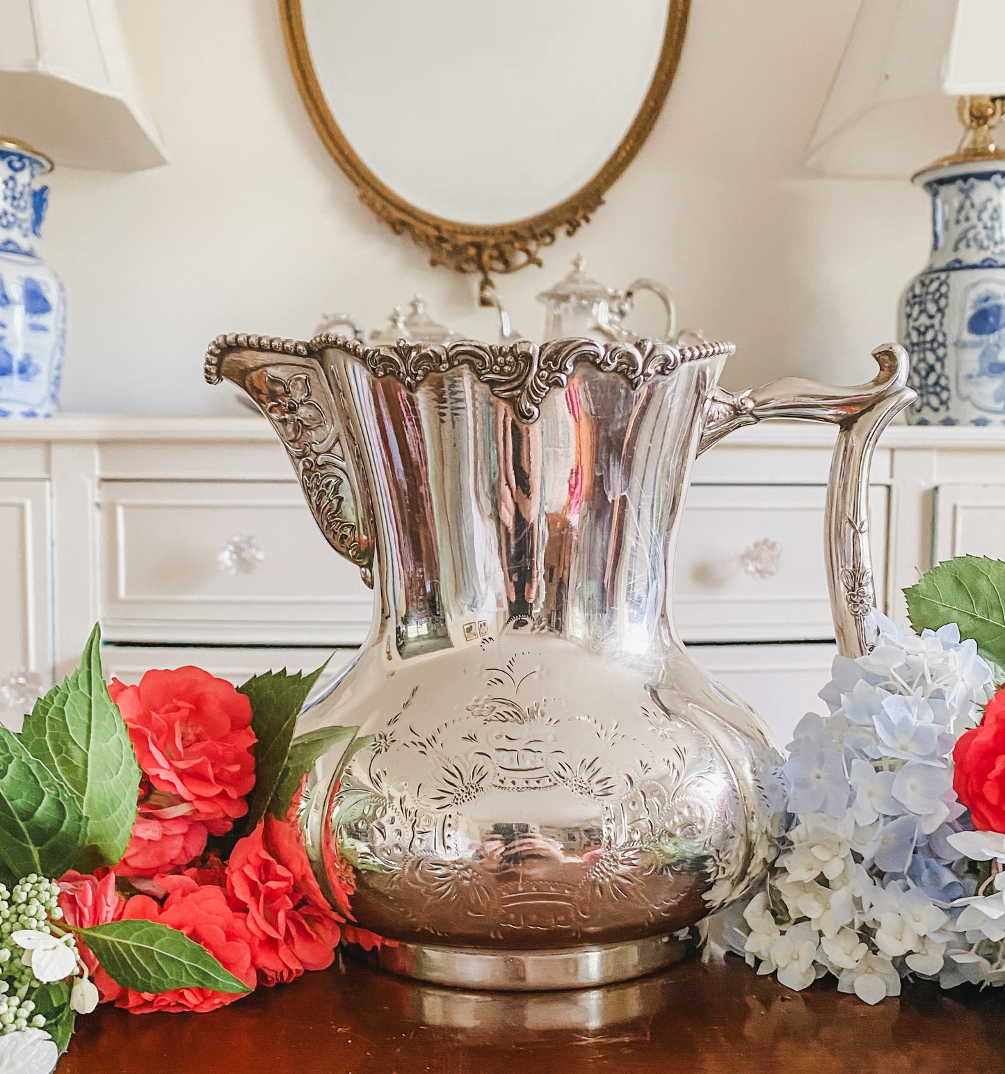 Ornate Antique Pitcher by Pool