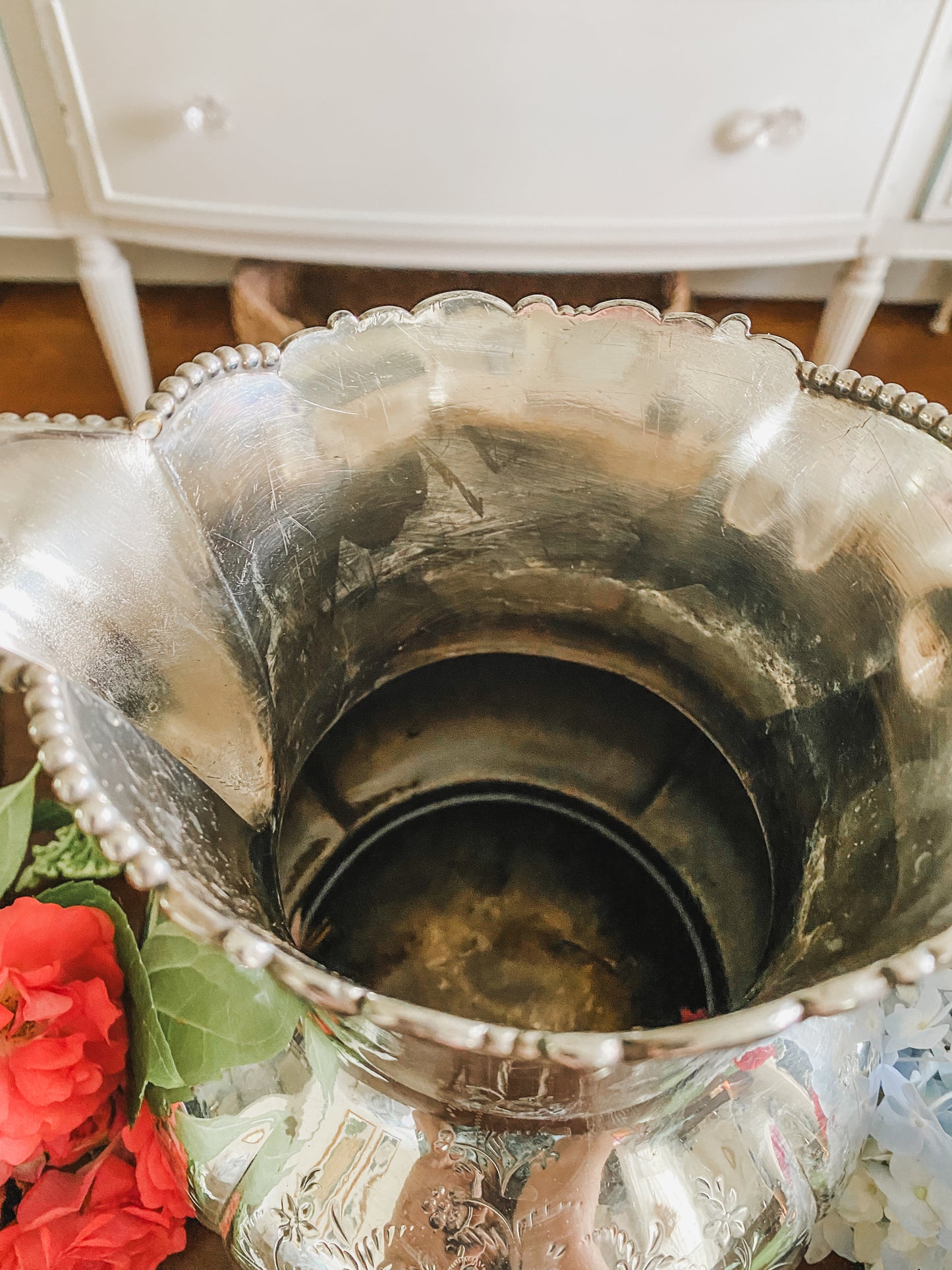 Ornate Antique Pitcher by Pool