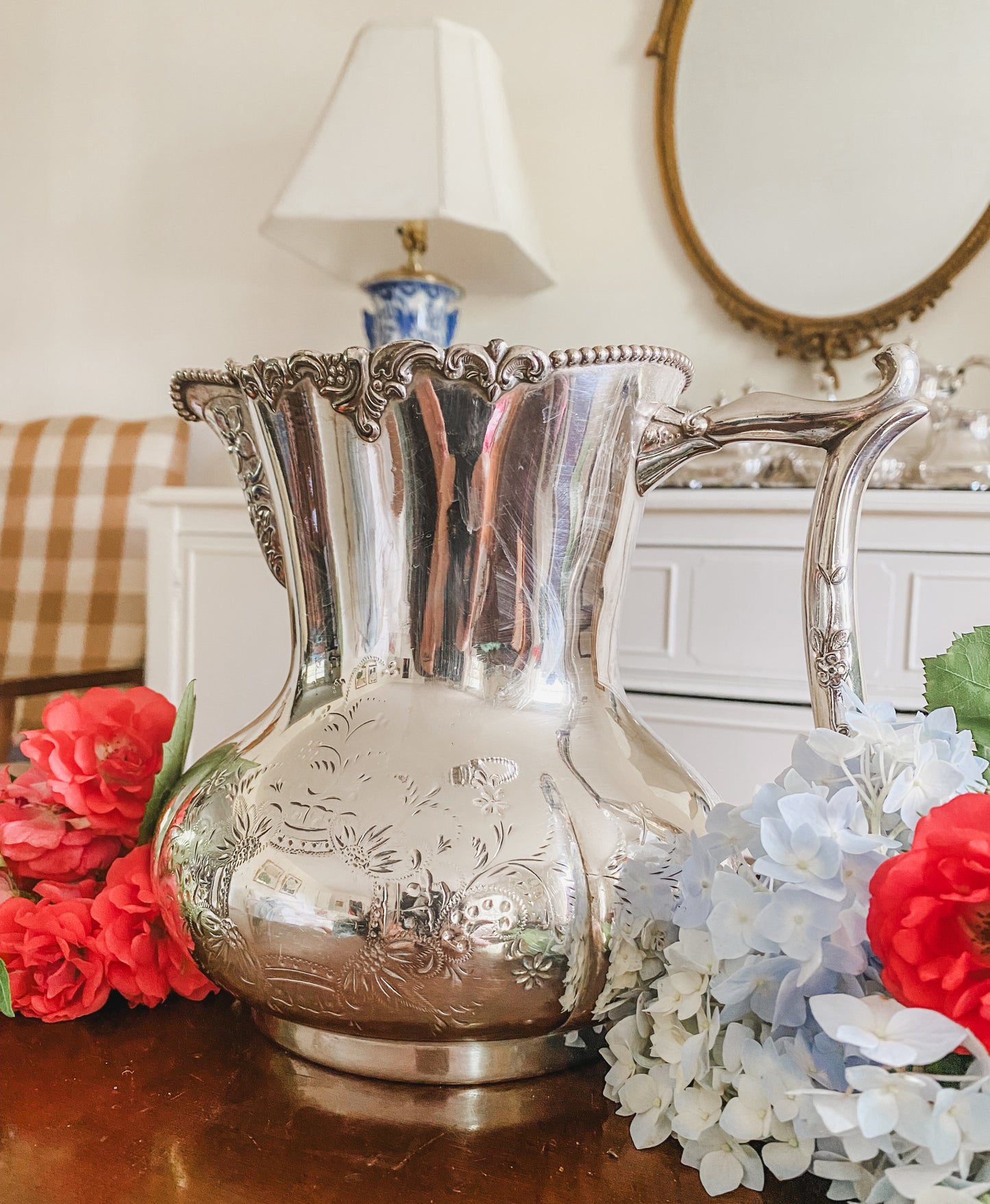 Ornate Antique Pitcher by Pool