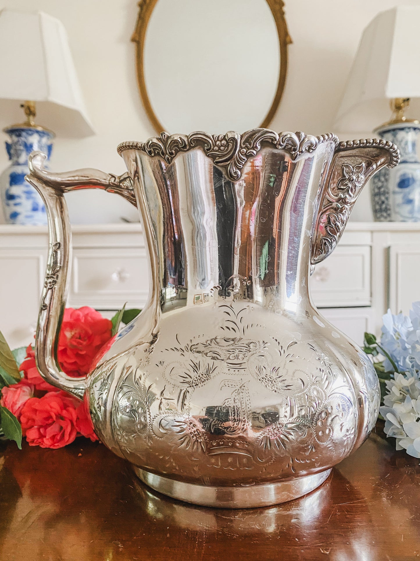 Ornate Antique Pitcher by Pool