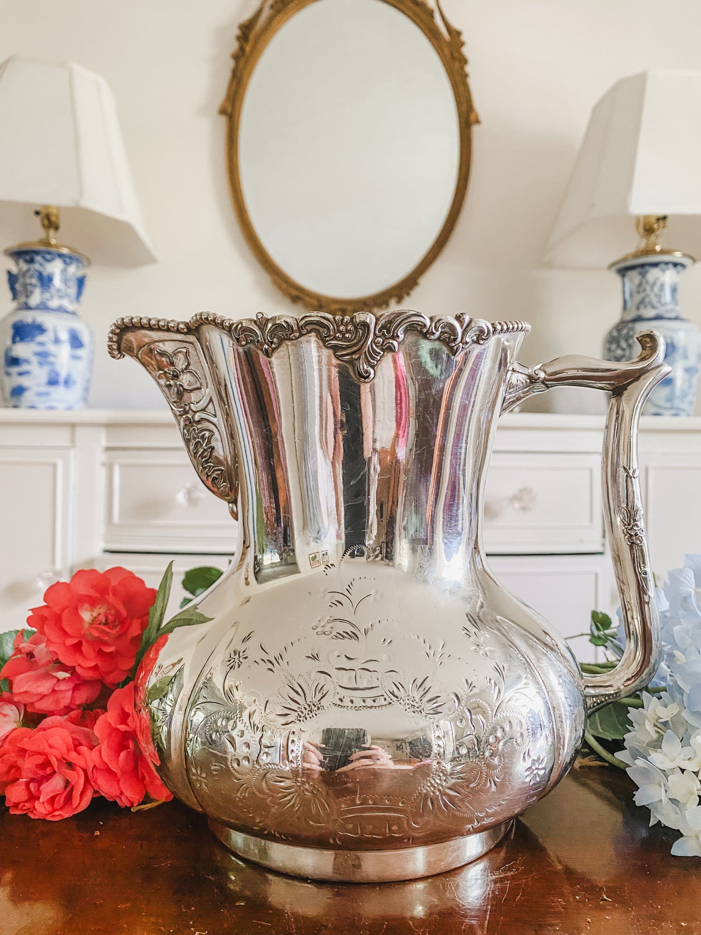 Ornate Antique Pitcher by Pool