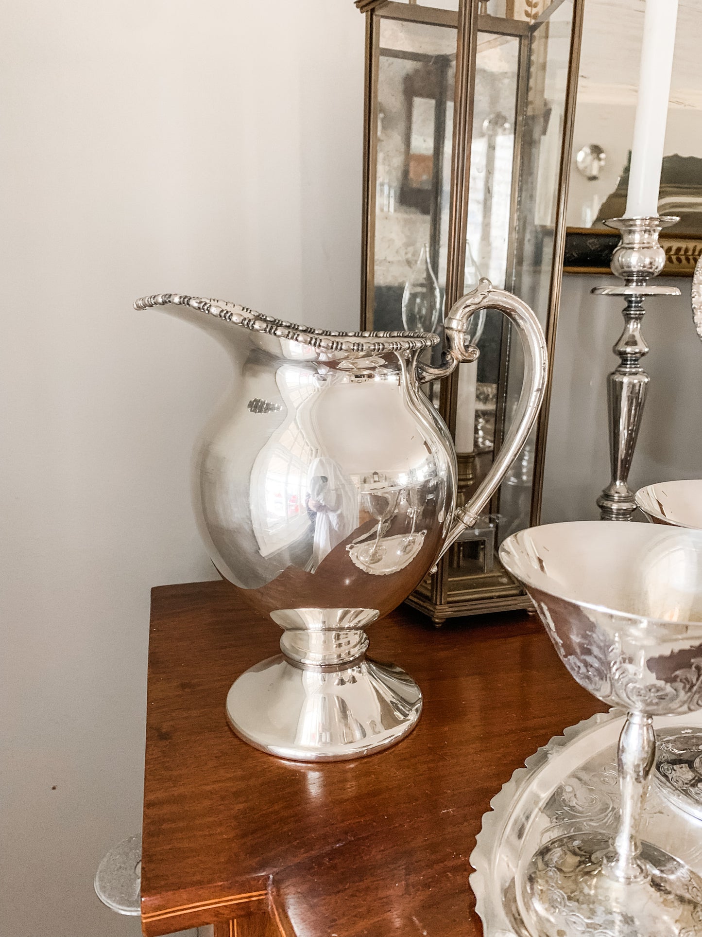 Elegant Antique Water Pitcher with Unique Shape