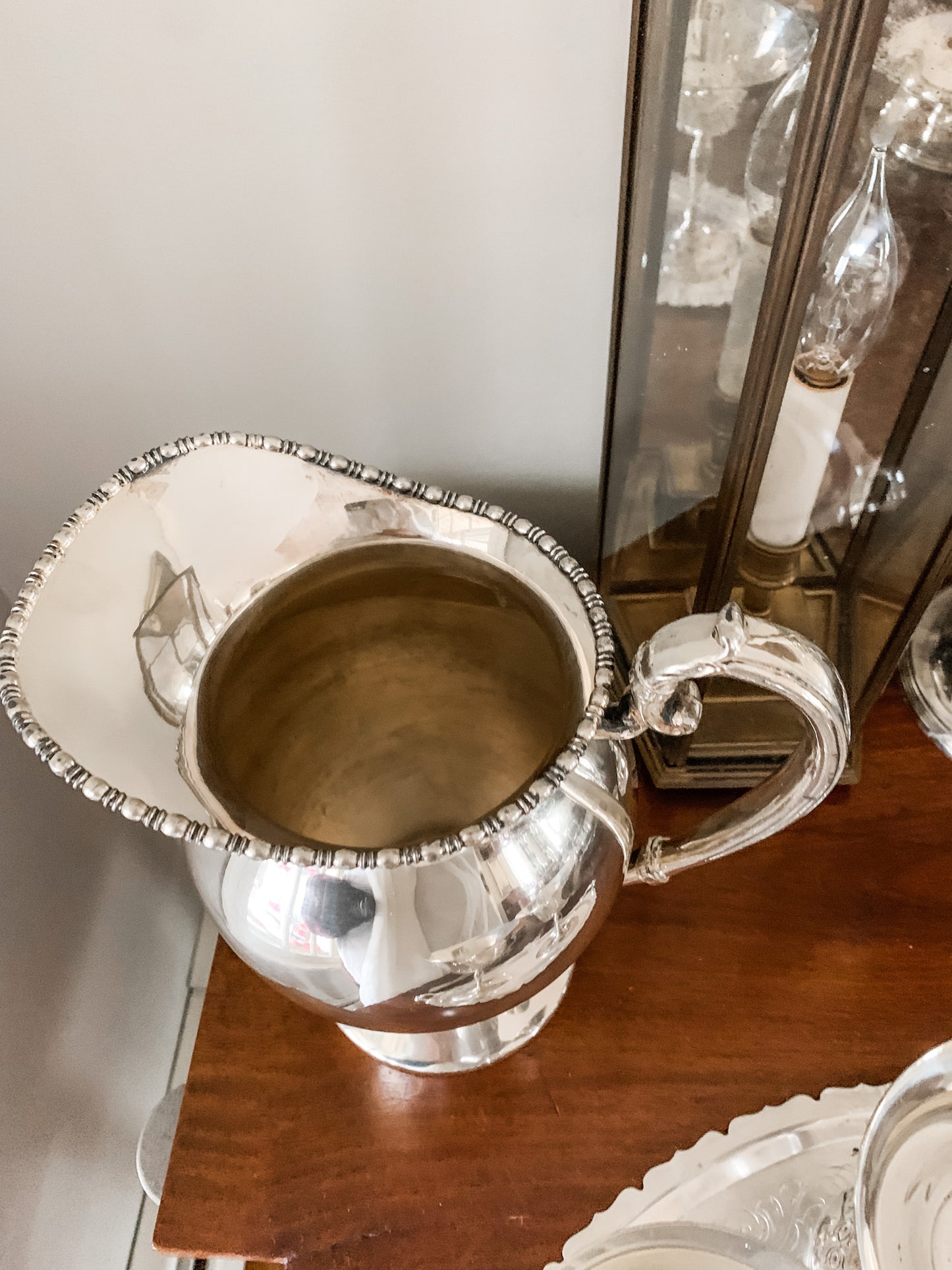 Elegant Antique Water Pitcher with Unique Shape