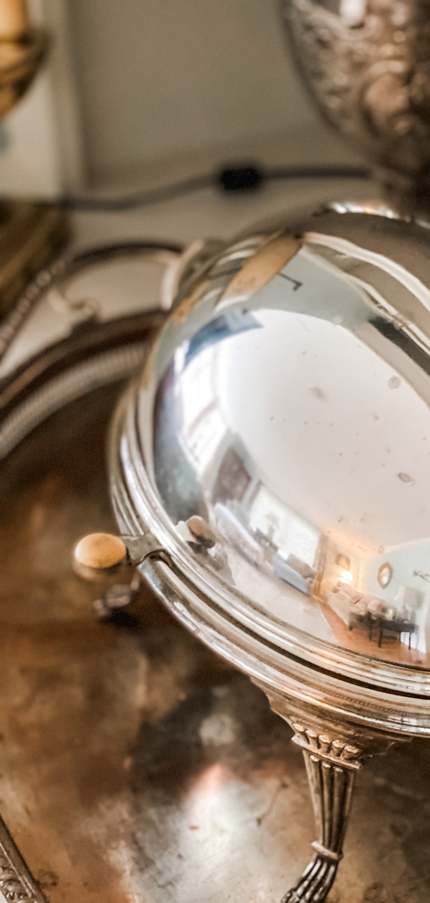 Antique Revolving Dome Silver Server (on the right )