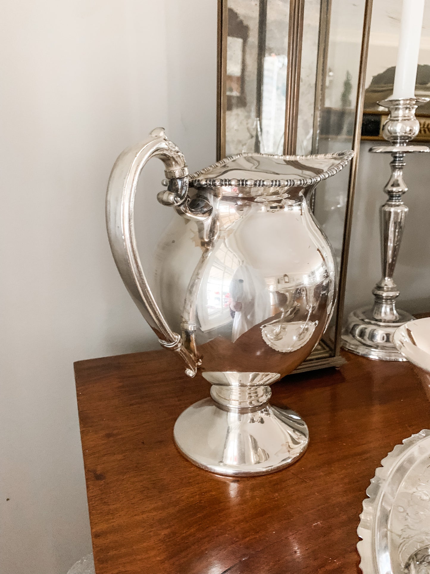 Elegant Antique Water Pitcher with Unique Shape