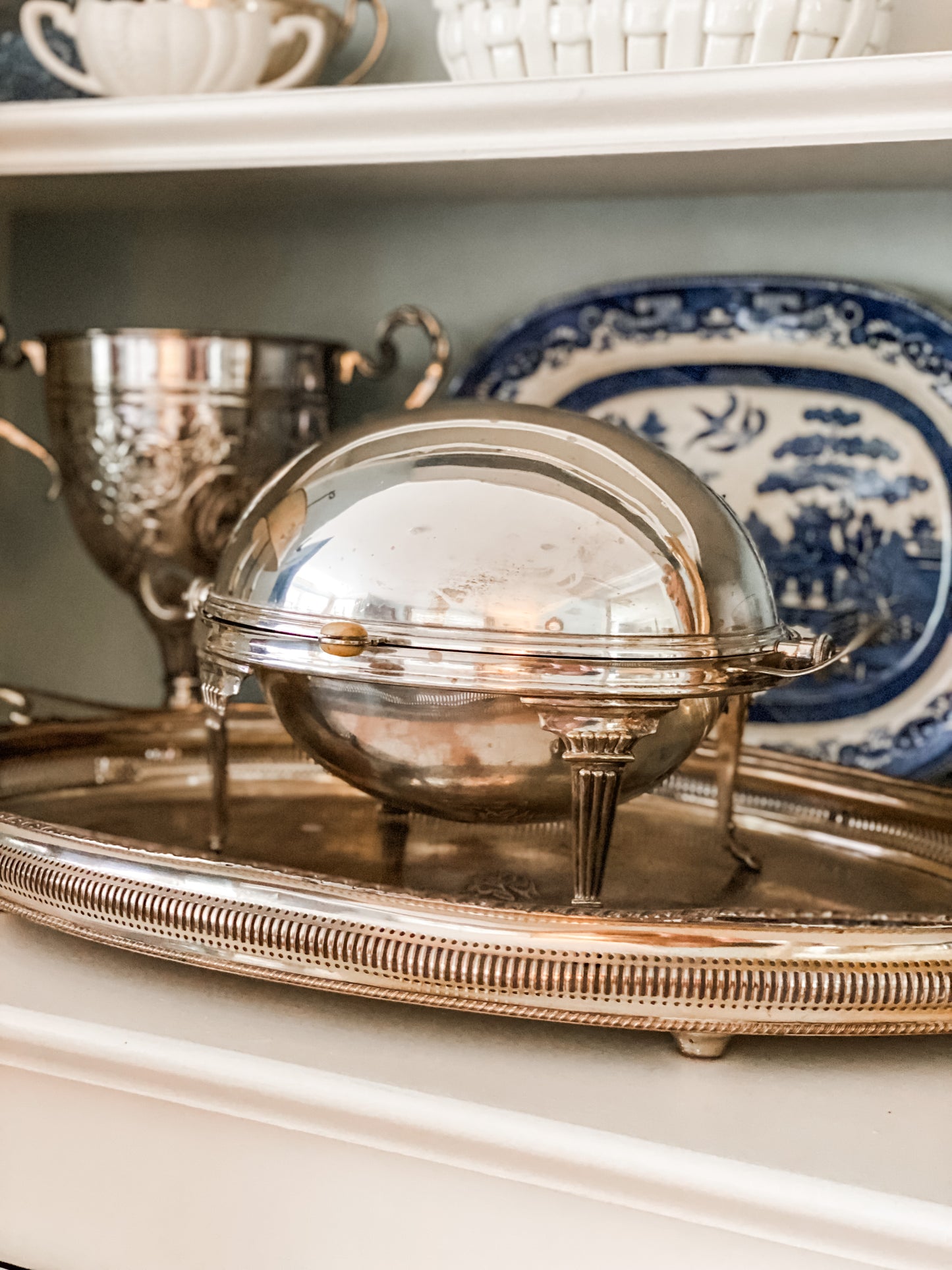 Antique Revolving Dome Silver Server (on the right )
