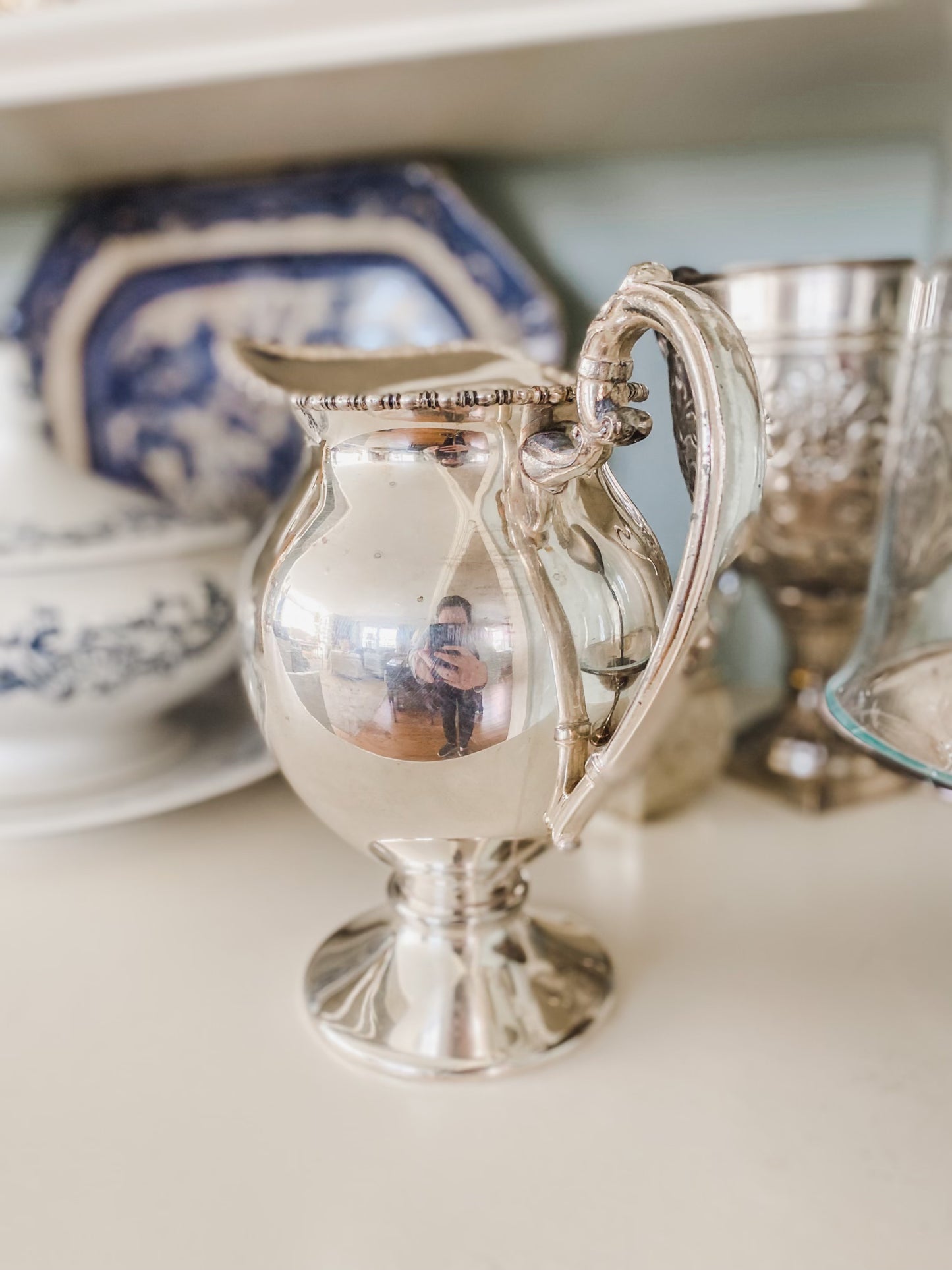 Elegant Antique Water Pitcher with Unique Shape