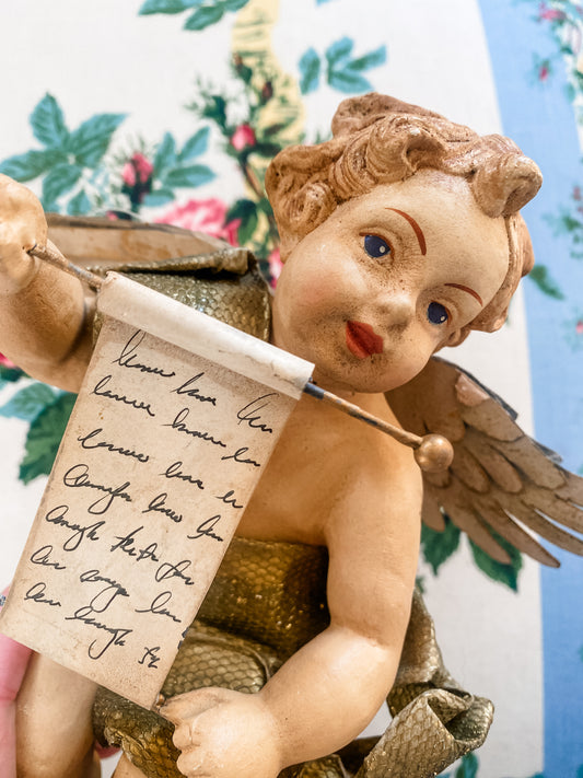 Hand-Painted Putto with Scroll and Metal Wings