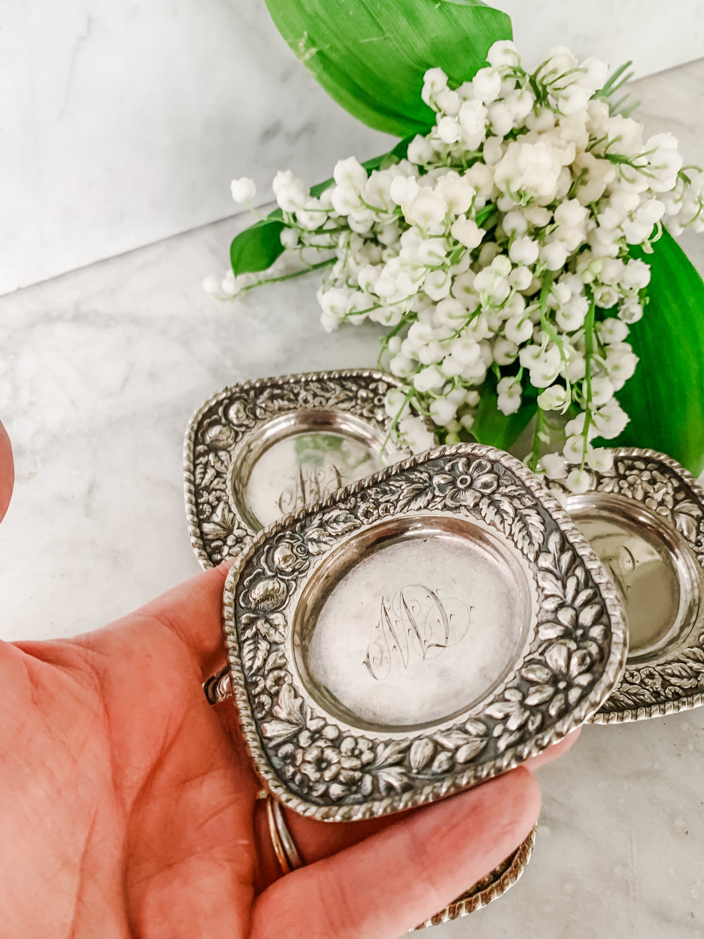 Antique Individual Butter Dishes with Floral Repoussé Border – Set of 5 (c. 1890–1915)